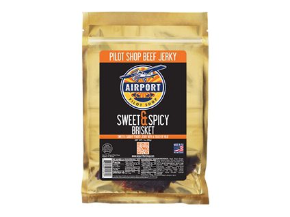 Savory Sweet & Spicy Beef Jerky on a wooden cutting board, perfect for those who love a balance of sweet and spicy flavors in a convenient on-the-go snack